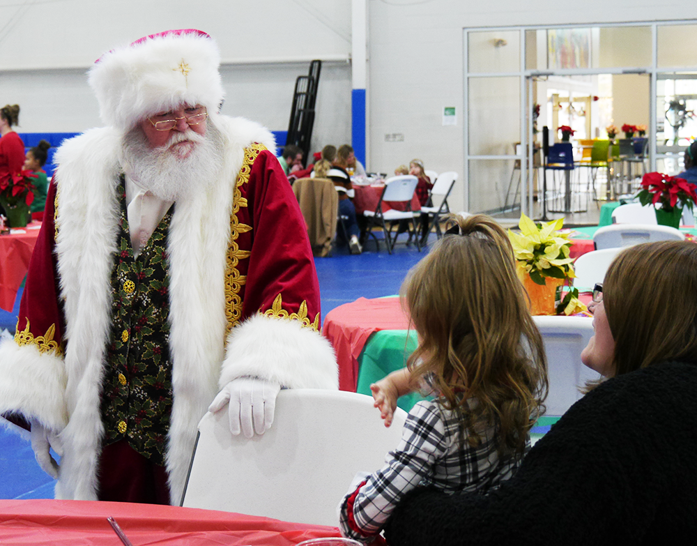 Santa visits with little girl