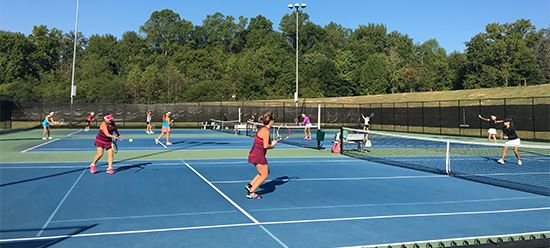 people playing tennis